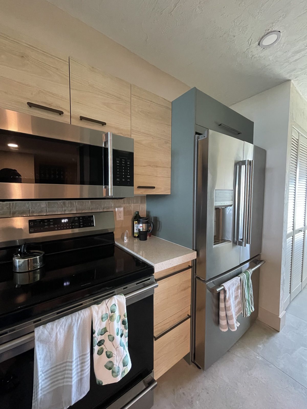 Modern kitchen with custom range and cabinetry